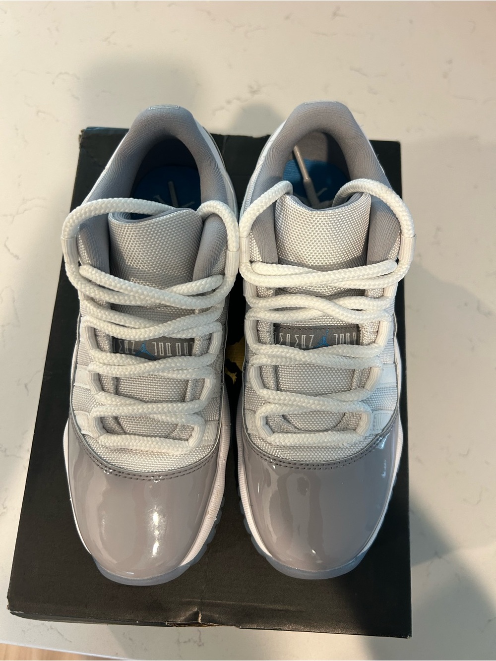 Jordan Air Retro 11 Low GS in White and Gray - Picture 2 of 5